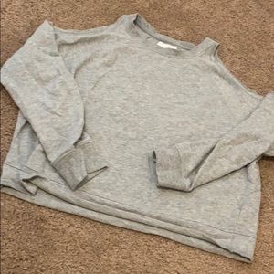 Victoria sport gray shoulder cut out workout top